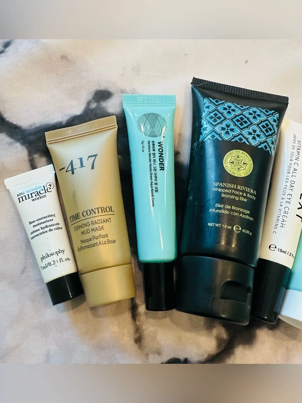 NWT Self-Care Bundle: Face & Body Bronzing Elixir, Eye Cream, Mud Mask, Creams